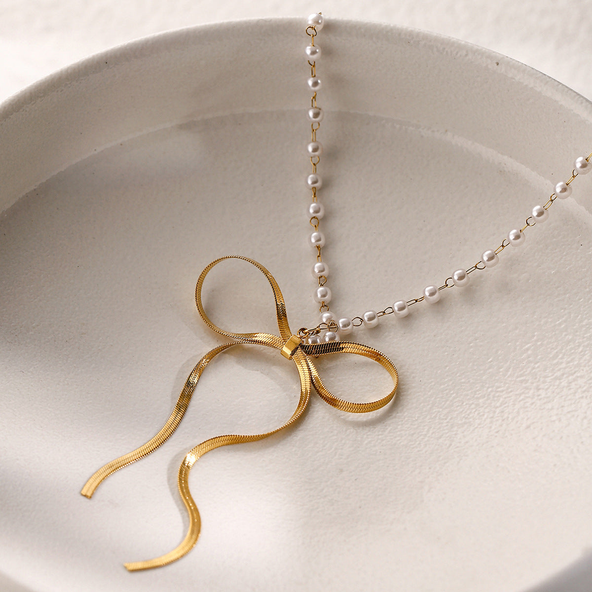 Stainless steel 18k gold-plated bow necklace