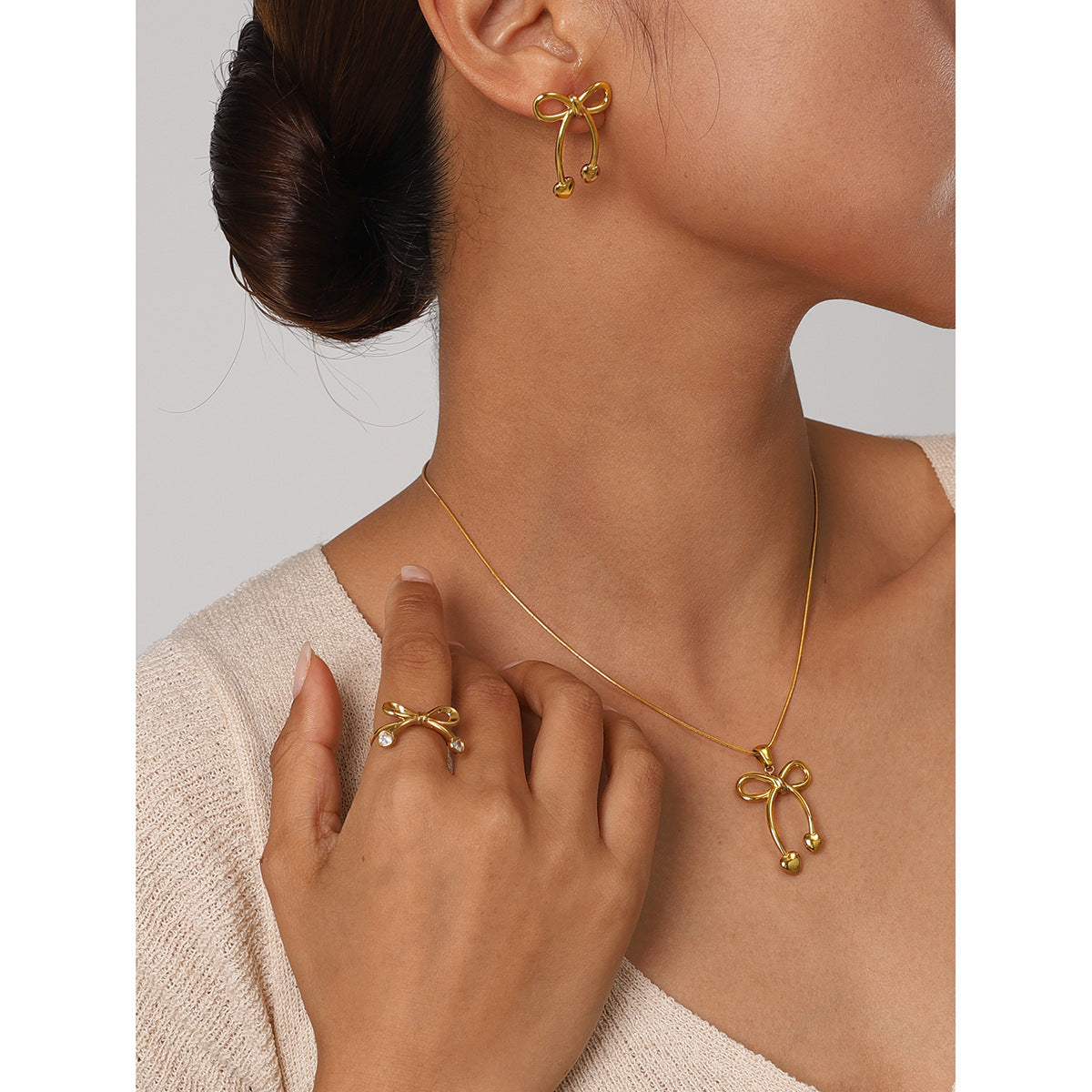 Stainless steel 18k gold-plated bow jewelry set