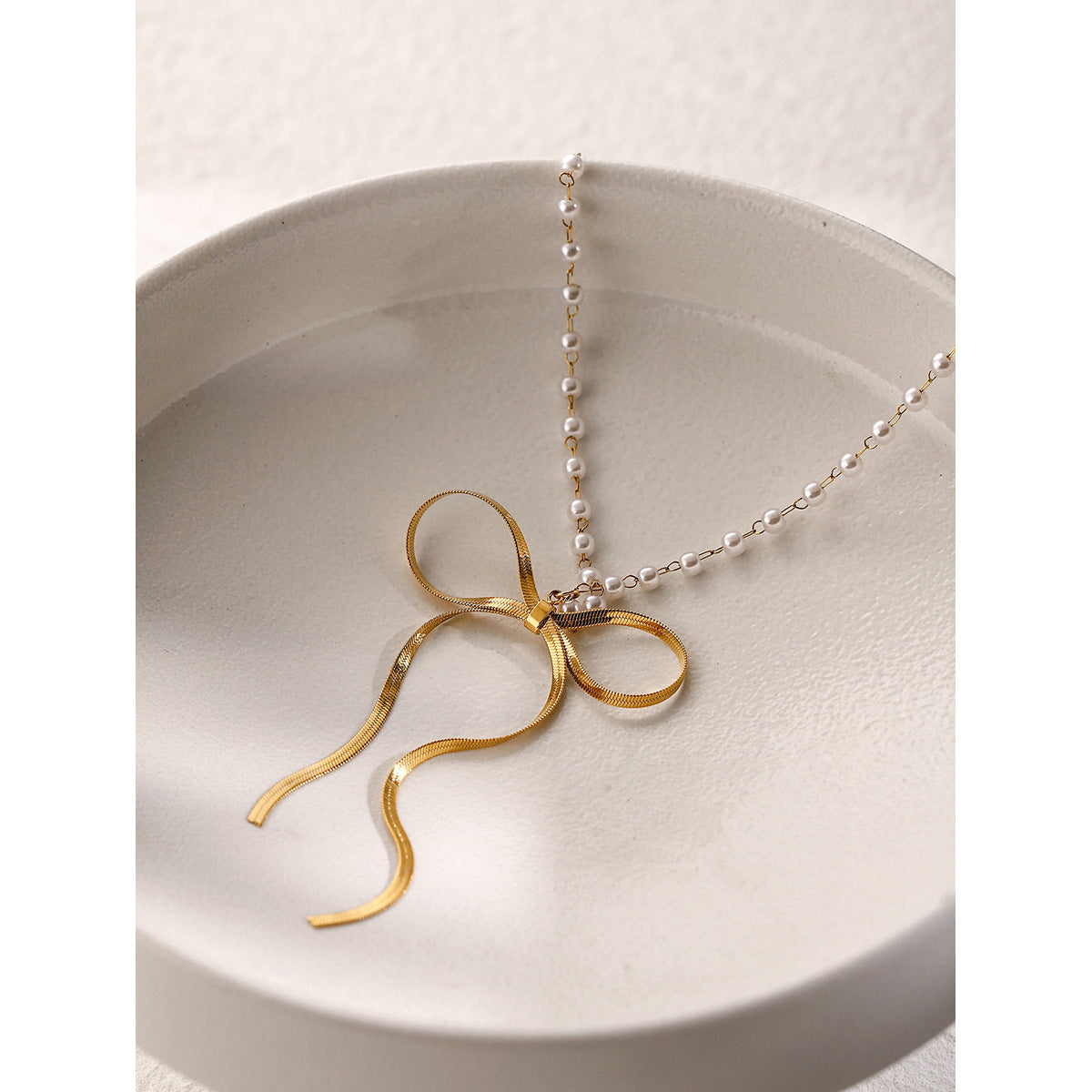 Stainless steel 18k gold-plated bow necklace