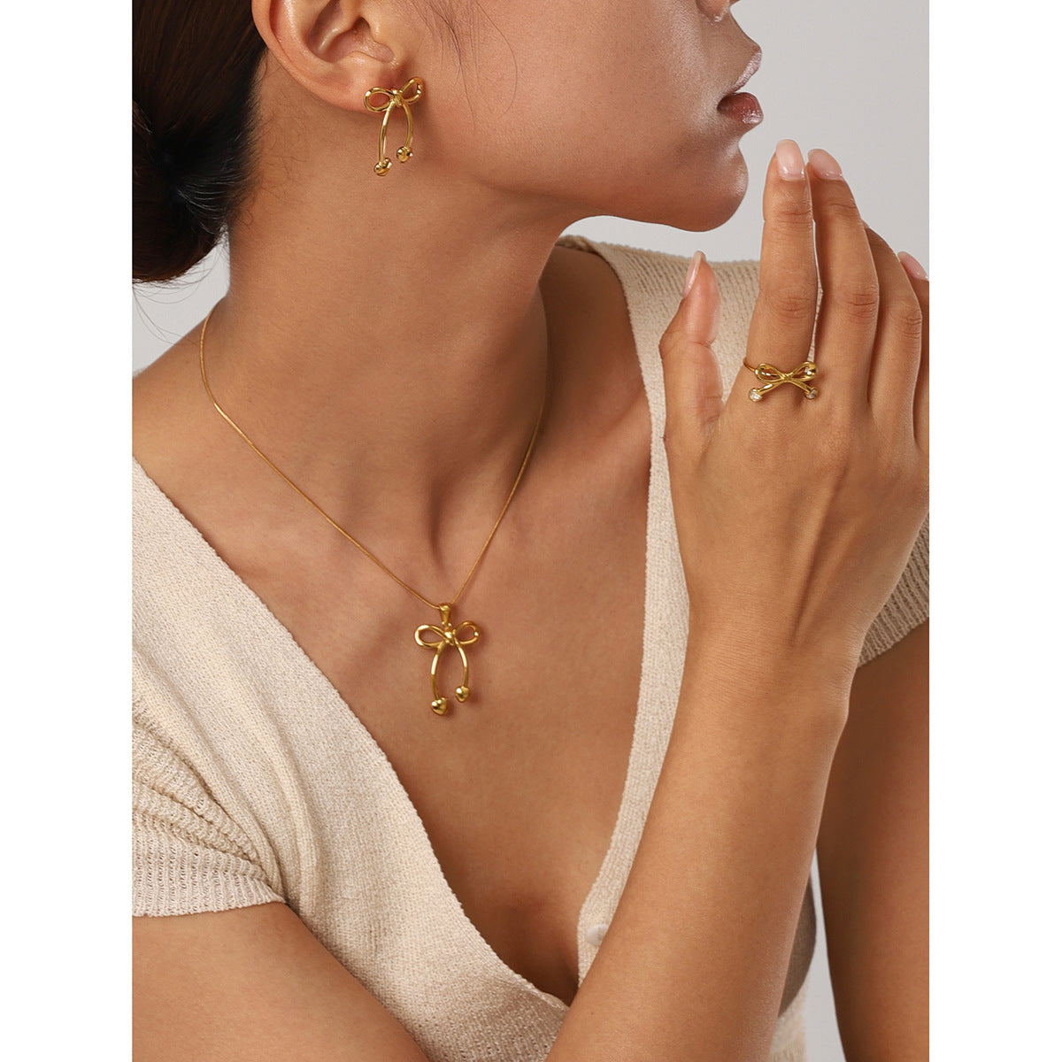 Stainless steel 18k gold-plated bow jewelry set