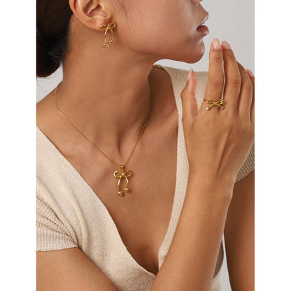 Conjunto de joyas de lazo de acero inoxidable bañado en oro de 18 quilates