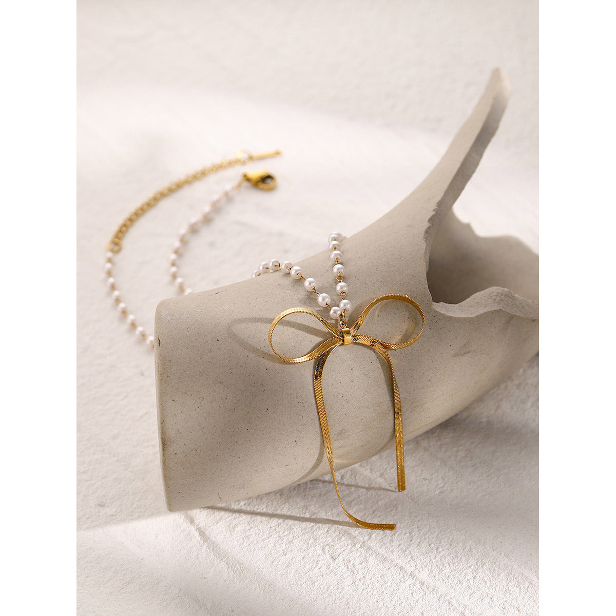Stainless steel 18k gold-plated bow necklace