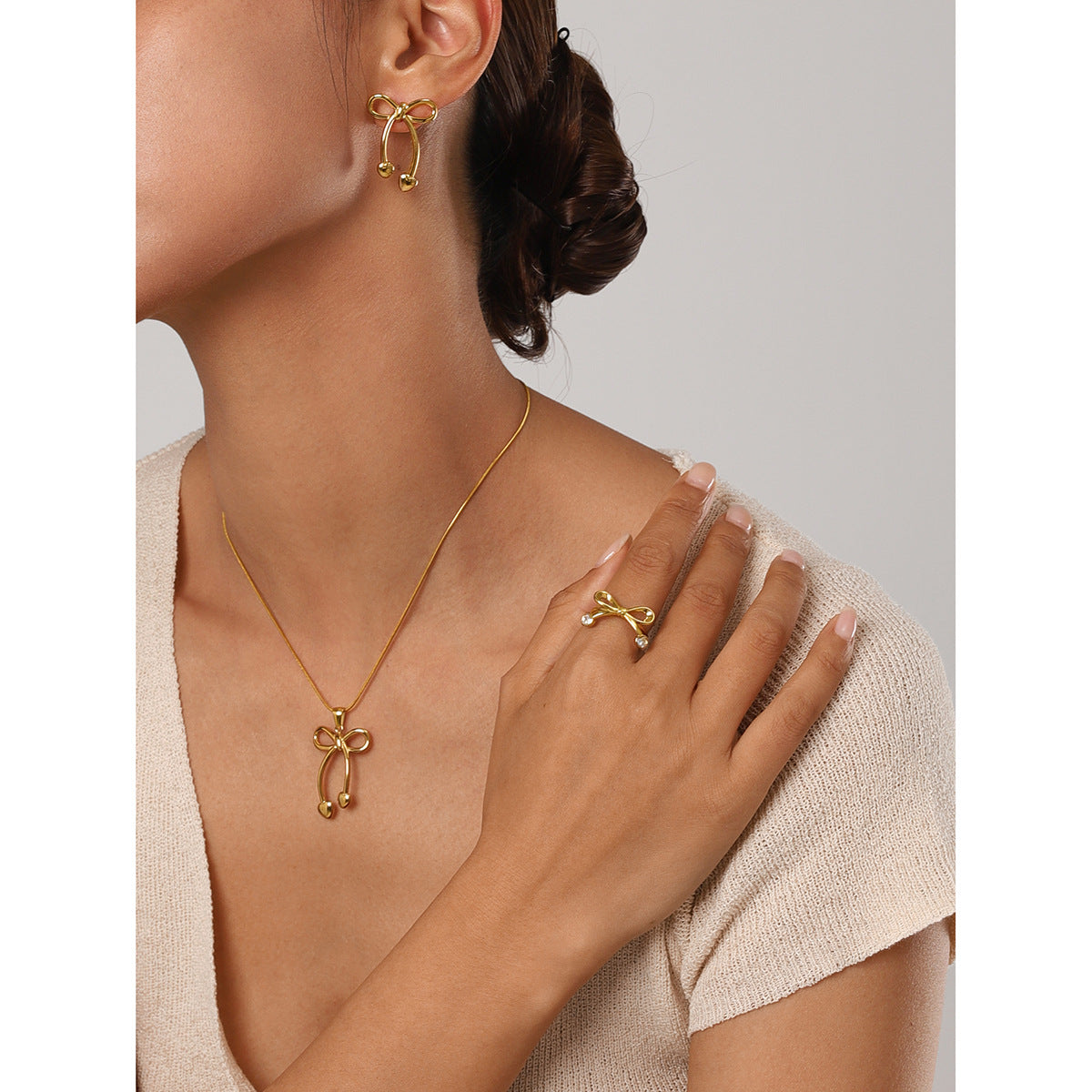 Stainless steel 18k gold-plated bow jewelry set