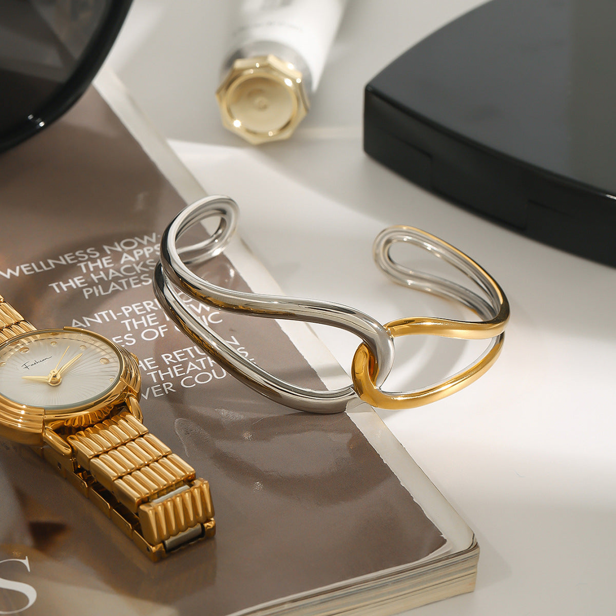 Stainless steel 18k gold-plated open-ended bracelet