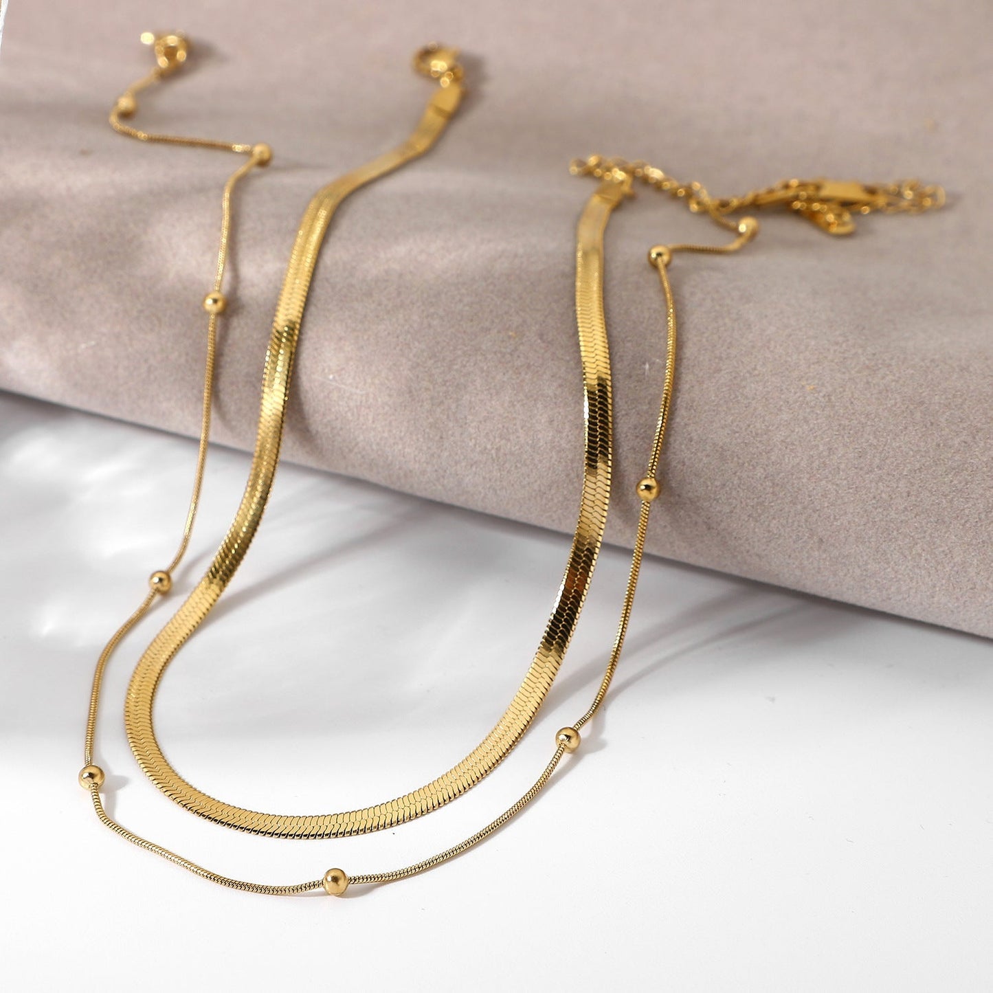 Stainless steel 14k gold-plated round bead necklace