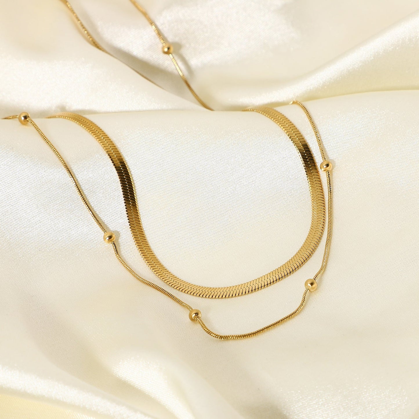 Stainless steel 14k gold-plated round bead necklace